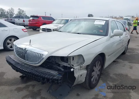 2007 Lincoln Town Car Designer Series from USA, damaged, VIN 1LNHM83W77Y604724